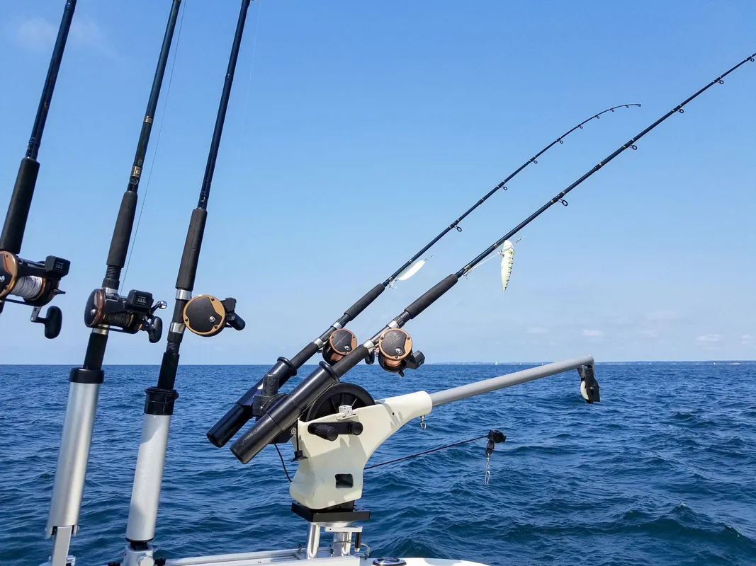 Trolling rods on boat in open water